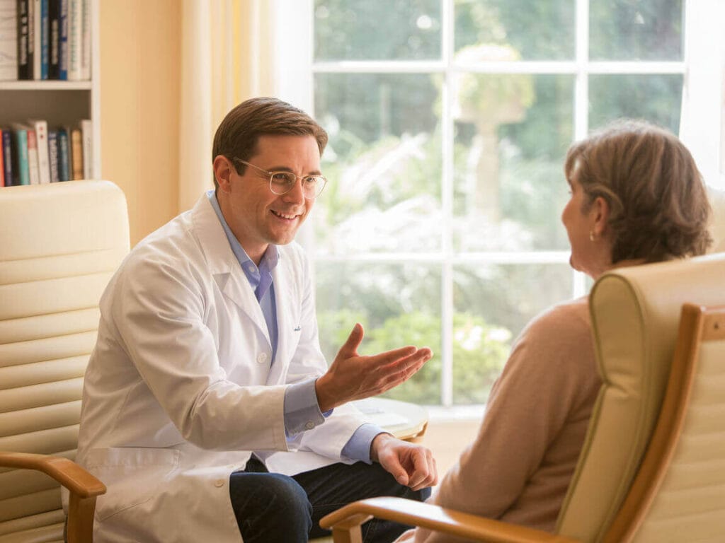 Doctor discussing vitamin D testing and how much vitamin D you need daily.